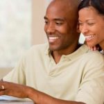 Couple Using Online Rental Tool